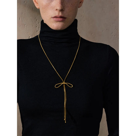 Collier long nœud papillon plaqué or véritable