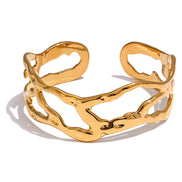 Bracelet manchette large ajouré plaqué or véritable
