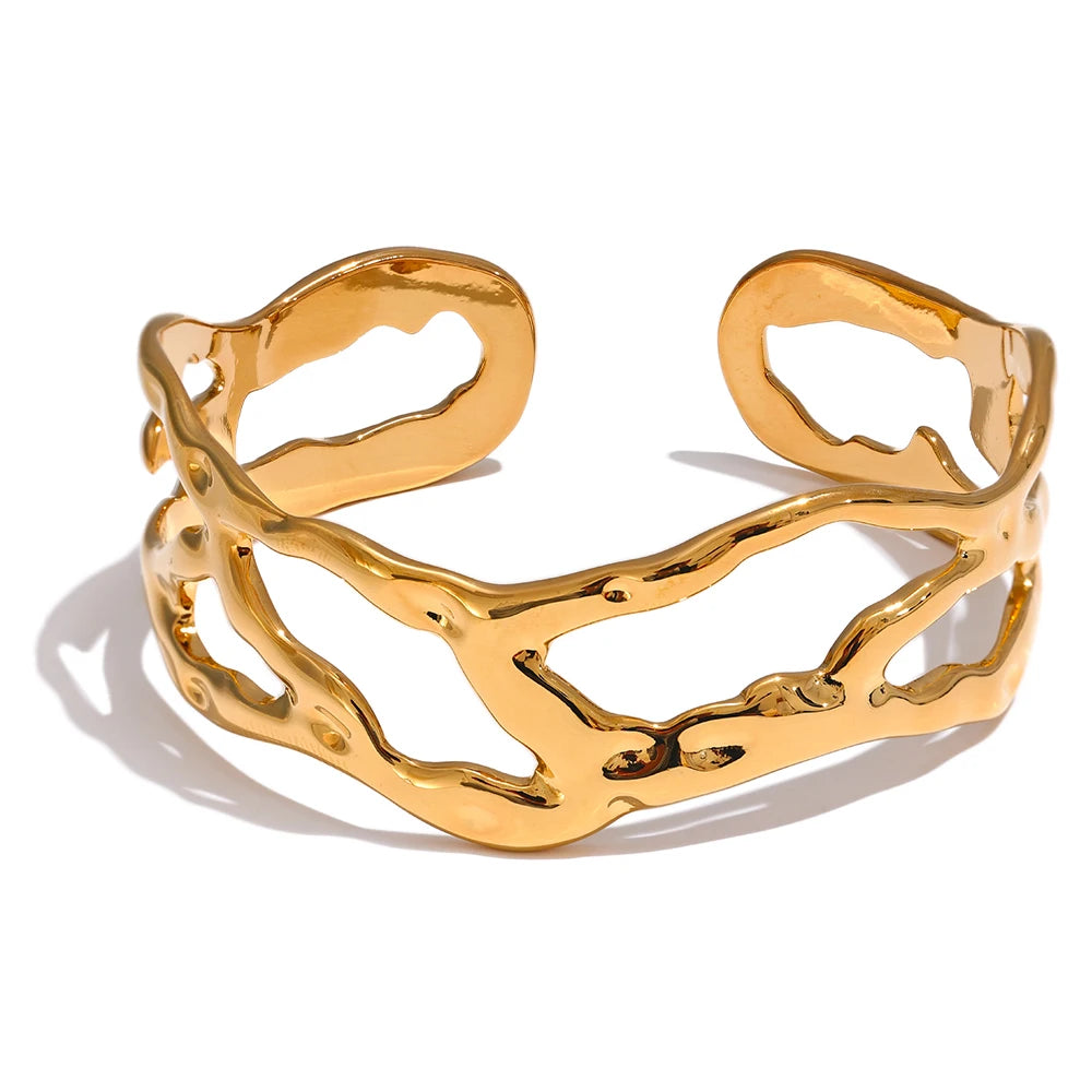 Bracelet manchette large ajouré plaqué or véritable