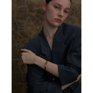 Bracelet manchette nœud plaqué or véritable